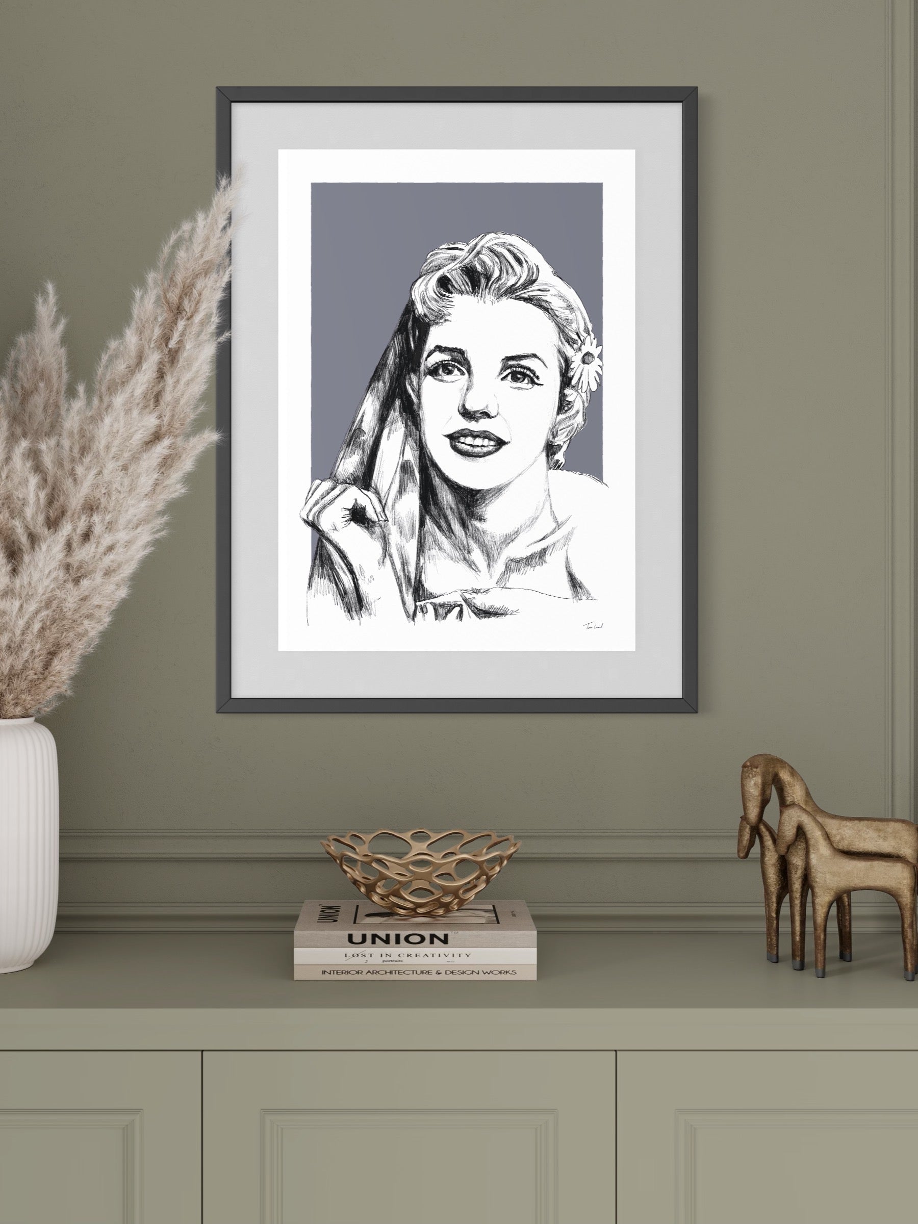 This image shows a giclee wall art print by Tom Laird Illustration of movie legend and Candle in The Wind subject, framed in a beautiful room with tasteful modern home decor. This art print is available from Tom Laird Illustration in various sizes.